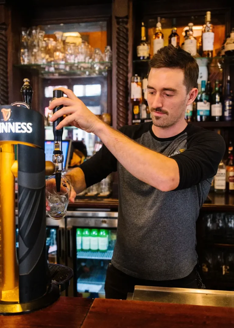 bartender pouring a draft